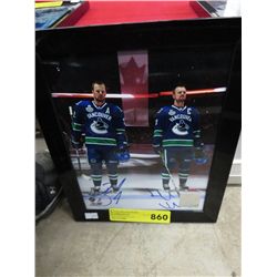 Autographed photo of Daniel & Henrik Sedin
