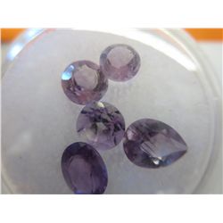 Gem jar - assorted cut amethyst gemstones