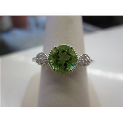 Ladies' peridot & diamond dinner ring