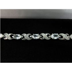 Ladies white topaz & diamond tennis bracelet