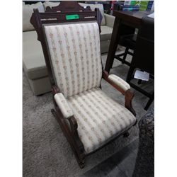 Vintage carved back rocking chair