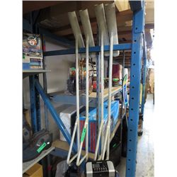 Four cast iron fishing rod holders