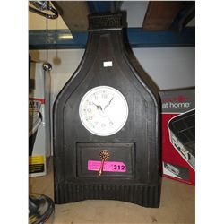 Clock in a wooden folk art style frame