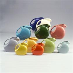 11 FIESTA pitchers: eight 7 1/2" x 8 1/4" in light blue, chartreuse, ivory, yellow (a few small f...