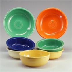 7 FIESTA bowls: four 9 1/4" vegetable bowls in turquoise, ivory, yellow, and cobalt (nicks); two...
