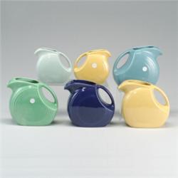 6 FIESTA water pitchers, four 7 1/2" in yellow, turquoise, light blue, and cobalt (scratches), an...
