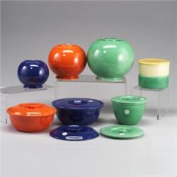 17 FIESTA assorted Kitchen Kraft pieces; a turquoise 7 1/2" lidded jar, a 6 1/2" red lidded jar,...