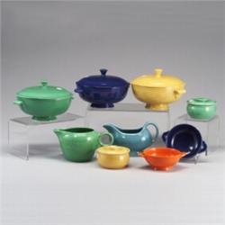 14 assorted FIESTA pieces; a light blue gravy boat (hairline to spout), a turquoise milk pitcher,...
