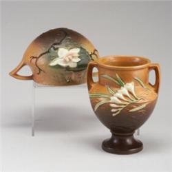 Two brown ROSEVILLE pieces: a brown Freesia urn (196-8") and a Magnolia hanging basket. Glaze sca...
