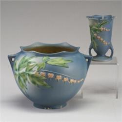 Two ROSEVILLE blue Bleeding Heart pieces: a spherical planter (as-is condition: chips, cracks, dr...