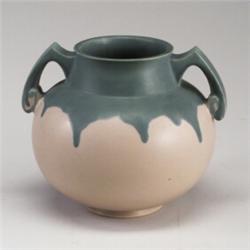 ROSEVILLE Carnelian I spherical vase covered in a dripping green glaze over a pale pink ground. R...
