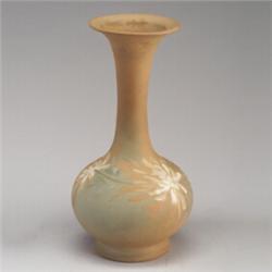 Tall OWENS Matt Utopian vase painted with chrysanthemums on a bisque ground. Abrasion to bottom,...
