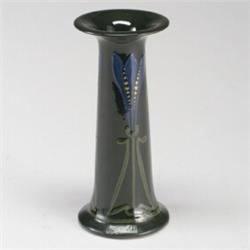 ROSEVILLE green Crocus vase with flaring rim, squeezebag-decorated in blue, yellow, and green. Re...