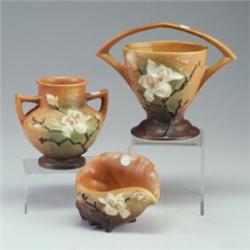 Three Roseville Magnolia Pieces A Shell Shaped Planter A Basket