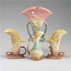 Four pieces: three HULL Wildflower vases, and one McCOY pitcher. Broken handle to one, chips to a...