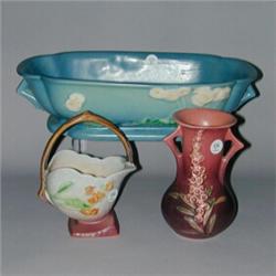 Three ROSEVILLE pieces: blue Primose console bowl (287-12"); pink Foxglove bulbous vase (43-6") (...
