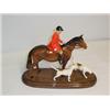 Image 1 : BESWICK HUNTSMAN and a pair of hounds mounted on wooden plinth, C1957-1995. 120 - 160...