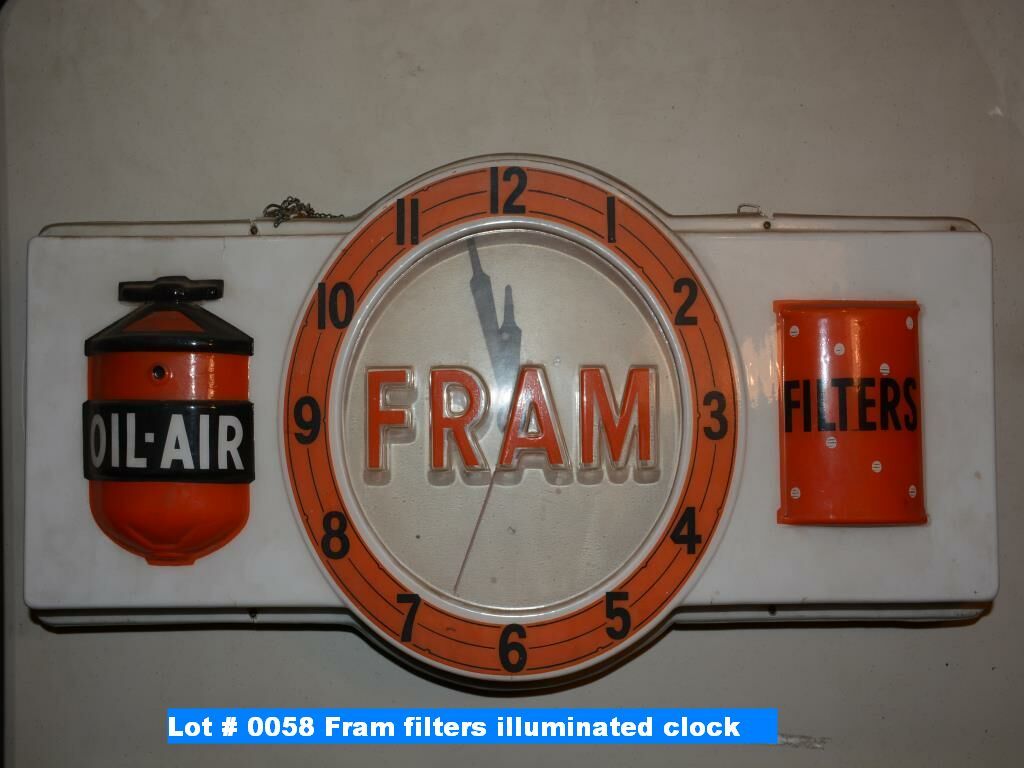 Fram filters illuminated clock