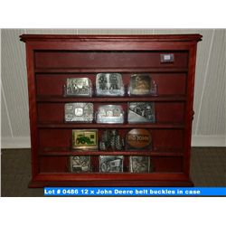 12 x John Deere belt buckles in case