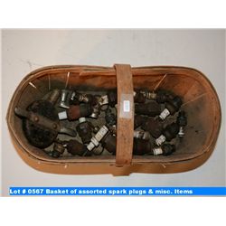 Basket of assorted spark plugs & misc. Items