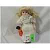 Image 1 : SMALL PORCELAIN DOLL WHITE DRESS