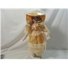 Image 1 : 17" PORCELAIN DOLL IN PEACH DRESS