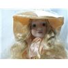 Image 2 : 17" PORCELAIN DOLL IN PEACH DRESS