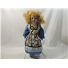 Image 1 : PORCELAIN DOLL IN BLUE KNIT DRESS