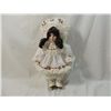 Image 1 : SMALL PORCELAIN DOLL IN WHITE DRESS