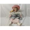 Image 1 : 22" PORCELAIN DOLL WITH COUNTRY DRESS