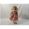 Image 1 : PORCELAIN DOLL IN MAUVE DRESS WITH STAND