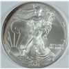 Image 1 : 2004 AMERICAN SILVER EAGLE, GEM UNC   SOME TONING.