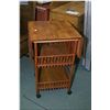 Image 1 : Three tiered occasional table with flip up sides on new castors