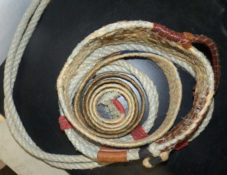 Bag of Bull Riders Gear Red Wrangler Bag with Gourley Bull Rope & Pad