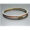 Image 1 : 18-Karat Yellow Gold, Diamond and Ruby Bangle Bracelet...