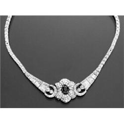 18-Karat White Gold, Diamond and Ruby Necklace...