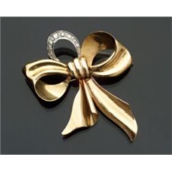 18-Karat Yellow and White Gold and Diamond Bowknot Brooch...