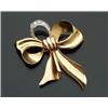 Image 1 : 18-Karat Yellow and White Gold and Diamond Bowknot Brooch...