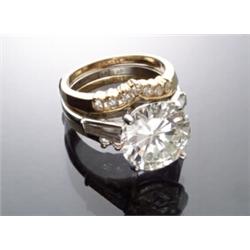 Platinum and Solitaire Diamond Ring...