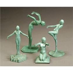 Four Frankart Patinated Metal Figures of Women...