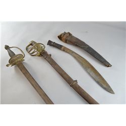 A kukri and two damaged 19th century swords