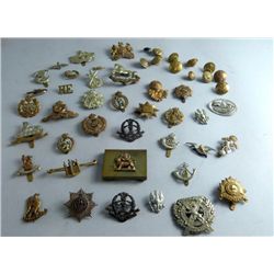 Collection of British military badges and buttons