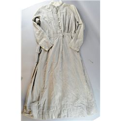 A WWI period nurses uniform, light fawn cotton with