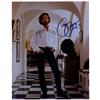 Image 1 : An 8" x 10" color photo,  hand signed by Eric Clapton.…