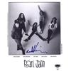 An 8" x 10" B&W Epic promo photo of Pearl Jam,  hand signed by Eddie Vedder.…