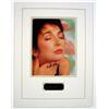 Image 1 : An 8" x 10", hand signed, color photo by Kate Bush.  Item has been double matted with an engraved…