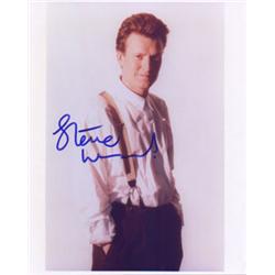 An 8 x 10 color photo hand signed by Steve Winwood.…