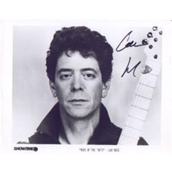 An 8 x 10, B&W promo photograph "Rock of the '80's" hand signed by Lou Reed.…