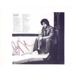 An 8 x 10, B&W photograph  hand signed by Billy Joel.…