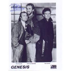 An 8 x 10, B&W promo photograph of Genesis hand signed by Phil Collins…
